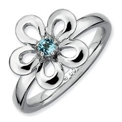 Silver stackable ring with blue topaz flower