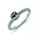 Silver stackable ring with blue topaz