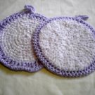 2 round purple crocheted bath facial kitchen scrubies