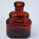 Flat and Rounded Brown Glass Bottle 2.25" x 1.5" x 1"
