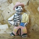 Ceramic Day of the Dead Figure, Man Wearing Hat Holding Blanket