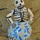 Ceramic Day of the Dead Figure, Woman in Blue Skirt with Pink Flower Design Ceramic Day of the Dead Figure, Woman in Blue Skirt with Pink Flower Design
