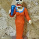 Clay Day of the Dead Figure, Female Singer in Orange Clay Day of the Dead Figure, Female Singer in Orange