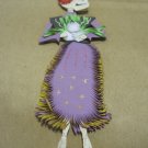 Hand Cut Paper Day of the Dead Skeleton Holding Flowers