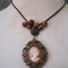 70's Wood Cameo Pendant with Handmade Glass Beads on Leather Cord, Necklace 70's Wood Cameo Pendant with Handmade Glass Beads on Leather Cord, Necklace