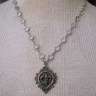 Silver Fleur De Lis Shield Pendant on Silver Wrapped Crystal Chain Necklace Silver Fleur De Lis Shield Pendant on Silver Wrapped Crystal Chain Necklace
