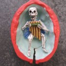 Day of the Dead Skeleton Playing Flute Walnut Ornament