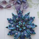 Colorful Flower Pendant with Colored Rhinestones on Purple Glass Beaded Necklace Colorful Flower Pendant with Colored Rhinestones on Purple Glass Beaded Necklace