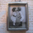 "First Kiss" Vintage Black and White Children Print Charm, Necklace Pendant.