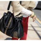 Gold studded handbag