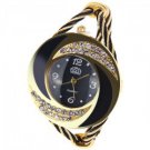 gold and black banded watch