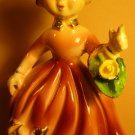 VINTAGE ANTIQUE PORCELAIN FIGURINE LADY IN PINK WITH FLOWERS AND HAT JAPAN
