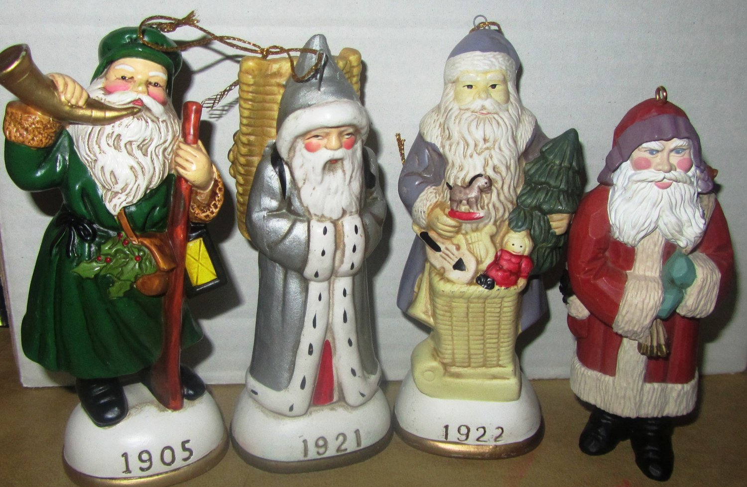 CHARMING COLLECTIBLE SET OF 4 CERAMIC SANTA CLAUS CHRISTMAS ORNAMENTS