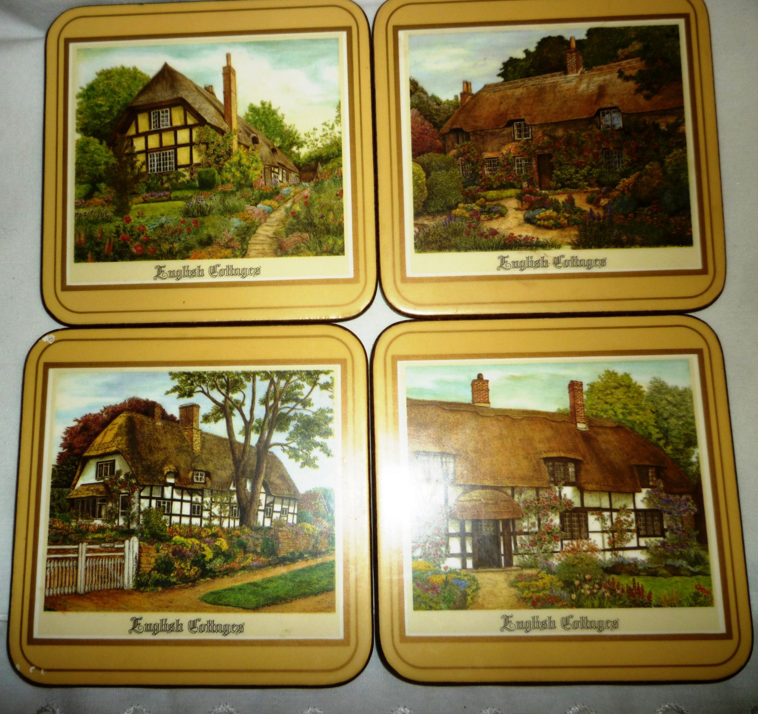 PIMPERNEL CORK LINED COASTERS SET OF 4  'ENGLISH COTTAGES' ENGLAND