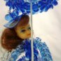 VINTAGE BLUE ROSETTE BEADS DOLL WITH UMBRELLA