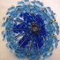 VINTAGE BLUE ROSETTE BEADS DOLL WITH UMBRELLA