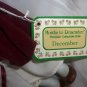 RUSS MONTH TO REMEMBER COLLECTION MINIATURE PORCELLAIN DOLL DECEMBER CHRISTMAS
