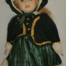 CHARMING DOLL IN A GREEN WINTER OUTFIT