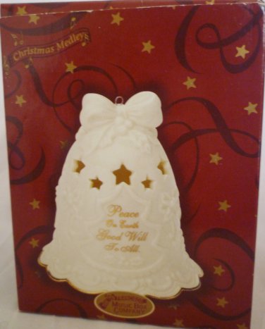 SAN FRANCISCO MUSIC BOX CHRISTMAS TREE ORNAMENT PORCELAIN BELL CHRISTMAS MEDLEY
