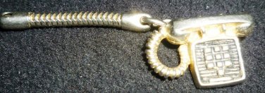 VINTAGE TOUCHPHONE PUNCH OLD FASHIONED PHONE CHARM RUGIN