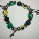 STRETCH BEADED MULTI-COLOR & SILVER WITH FISH & KEY CHARMS BRACELET STRETCH BEADED MULTI-COLOR & SILVER WITH FISH & KEY CHARMS BRACELET
