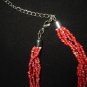 VINTAGE MULTISTRAND MULTI RED SEED BEAD & PEARL DISK RING NECKLACE
