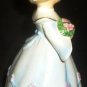 VINTAGE MUSIC BOX BISQUE PORCELAIN GIRL W/FLOWERS FIGURINE 'HAPPY BIRTHDAY'