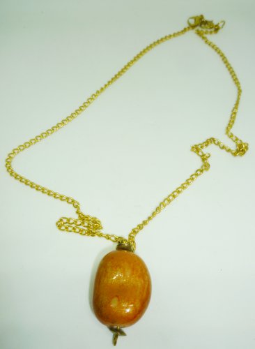 FASHION PEACH COLORED PENDANT ON A GOLD CHAIN DRESS