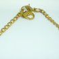 FASHION PEACH COLORED PENDANT ON A GOLD CHAIN DRESS