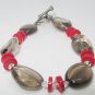 BEAUTIFUL ARTIST MADE CLEAR QUARTZ AND CORAL BEADED BRACELET
