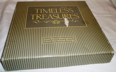 BRAND NEW TIMELESS TREASURES SET OF 4 SILVERPLATED EMBOSSED TRIVETS