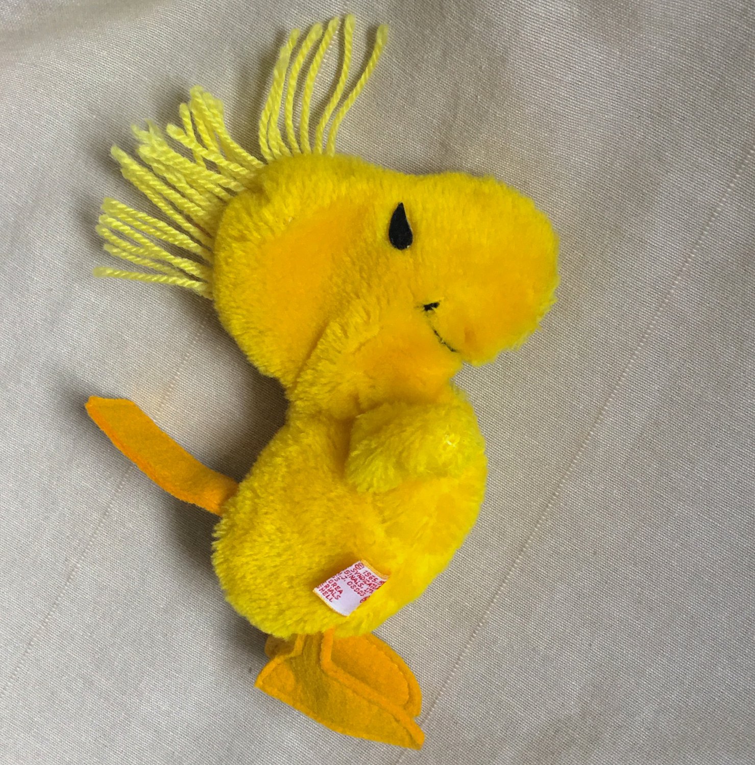 small woodstock stuffed animal