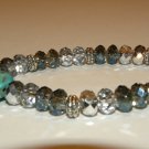 CRYSTAL BRACELET WITH SKULL CHARM