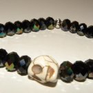 BLACK BRACELET WITH WHITE SKULL