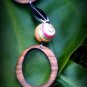 Retro Striped Glass spheres with funky ovals on Leather