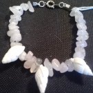 handcrafted 7.5" seashell and pink quartz chip bracelet