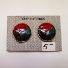 gold cast w/ red, black & green swirl appoxy