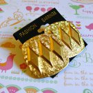 Gold shield w/ imprint