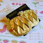 Gold shield w/ imprint