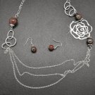 Brown and silver rose necklace and earring set!