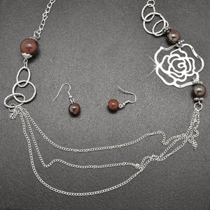 Brown and silver rose necklace and earring set!