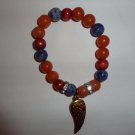Brown multi-toned bracelet with a dash of contrasting colors for added effect