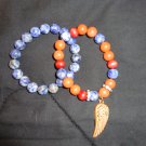 Beautiful combination of two brown and bluish-purplish beads with a dash of gold
