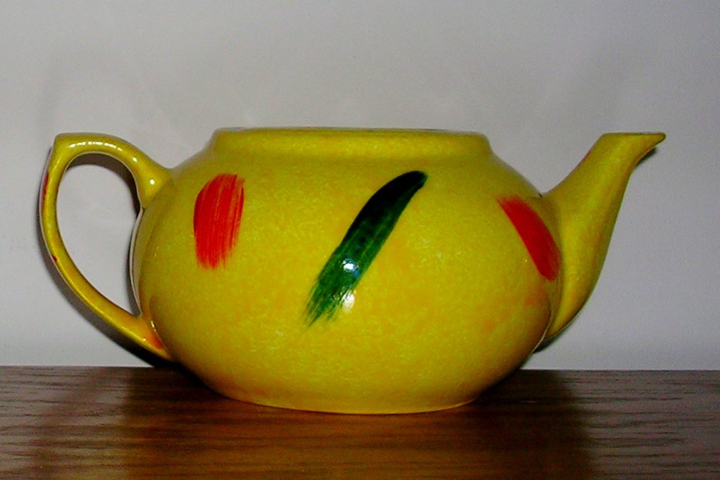 Small yellow teapot; Price Includes S&H.