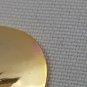 Switzerland Edelweiss Enamel Gold Colored Collectors Spoon White Floral Pattern