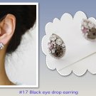 Black eye drop earring.