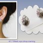 Black eye drop earring.