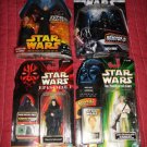FOUR DIFFERENT STAR WARS FIGURES DARTH VADER LUKE SKYWALKER PLUS 2 MORE