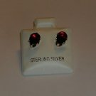 Sterling Silver Garnet 7mmx5mm Pear Cut Stud Earrings