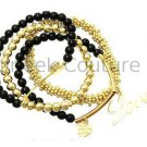 Gold And Black Cupids Love Bracelet Stack